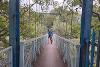 Cyclist on the Hikey suspension bridge