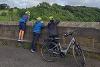 Cyclists looking off the viaduct towards Gibside